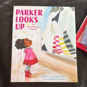Parker Looks Up Book